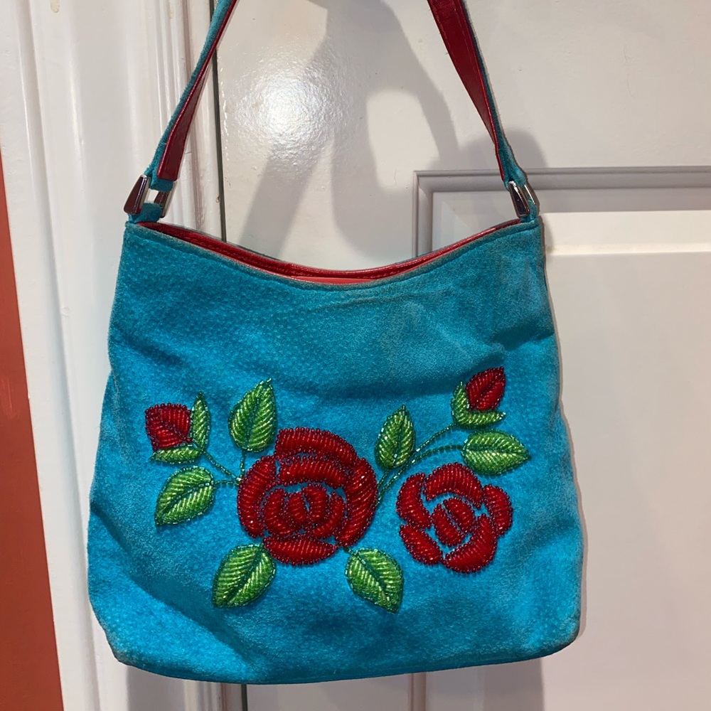 Vintage Isabella Fiore turquoise suede handbag.